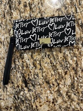 Betsey Johnson Black & White Luv Script Wristlet with Gold Plaque